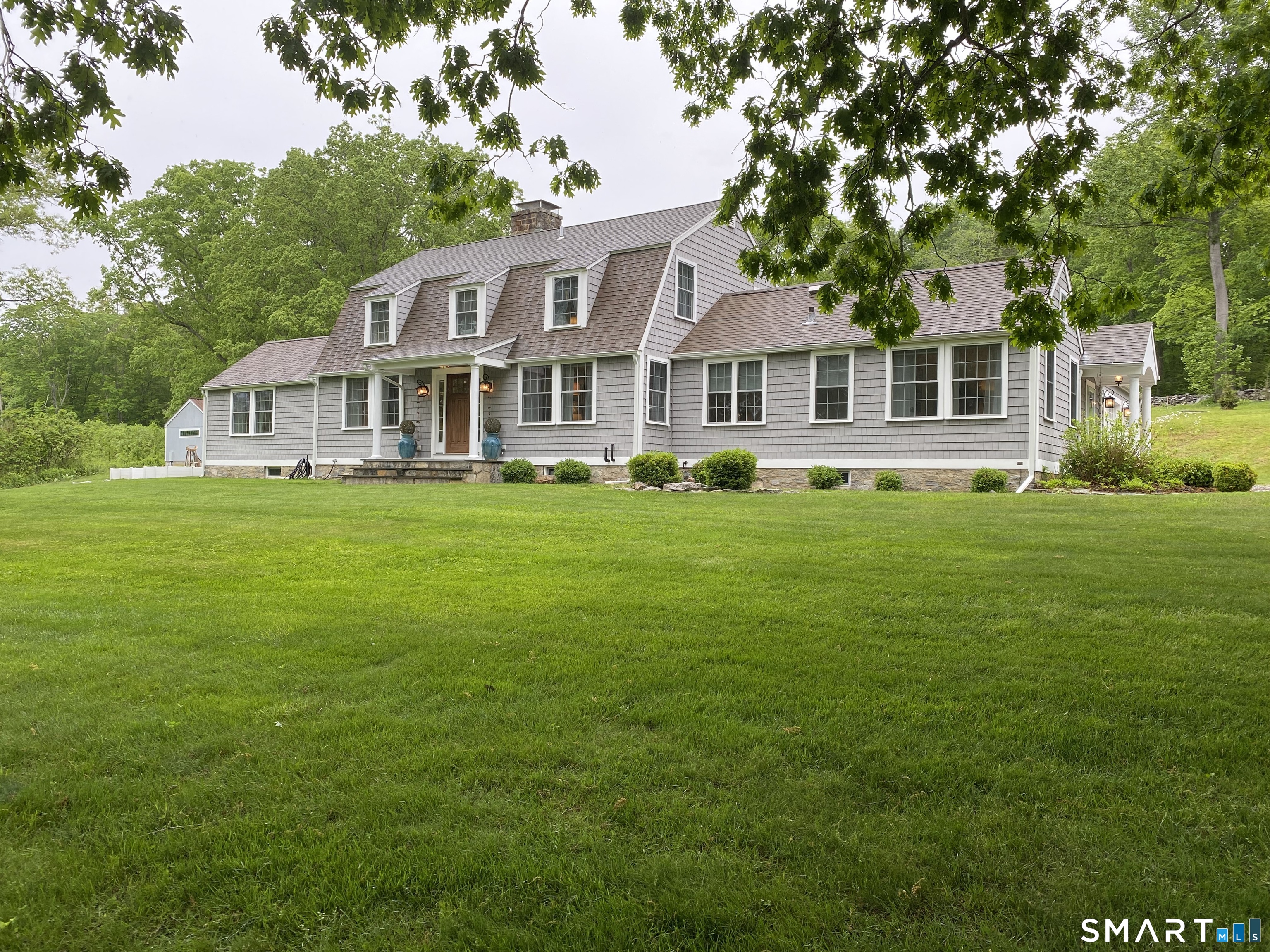 41 Old W Road East Haddam, CT 06423 - Photo 2 of 39 a front view of a house with a garden