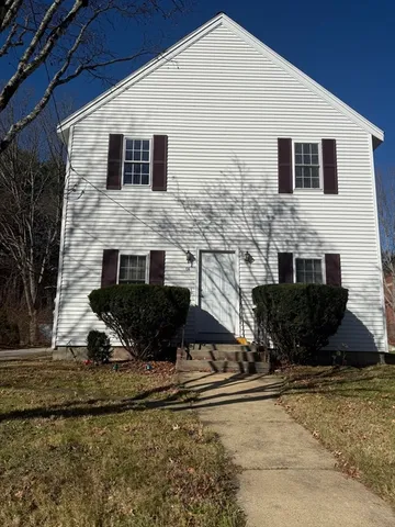 a front view of a house with windows