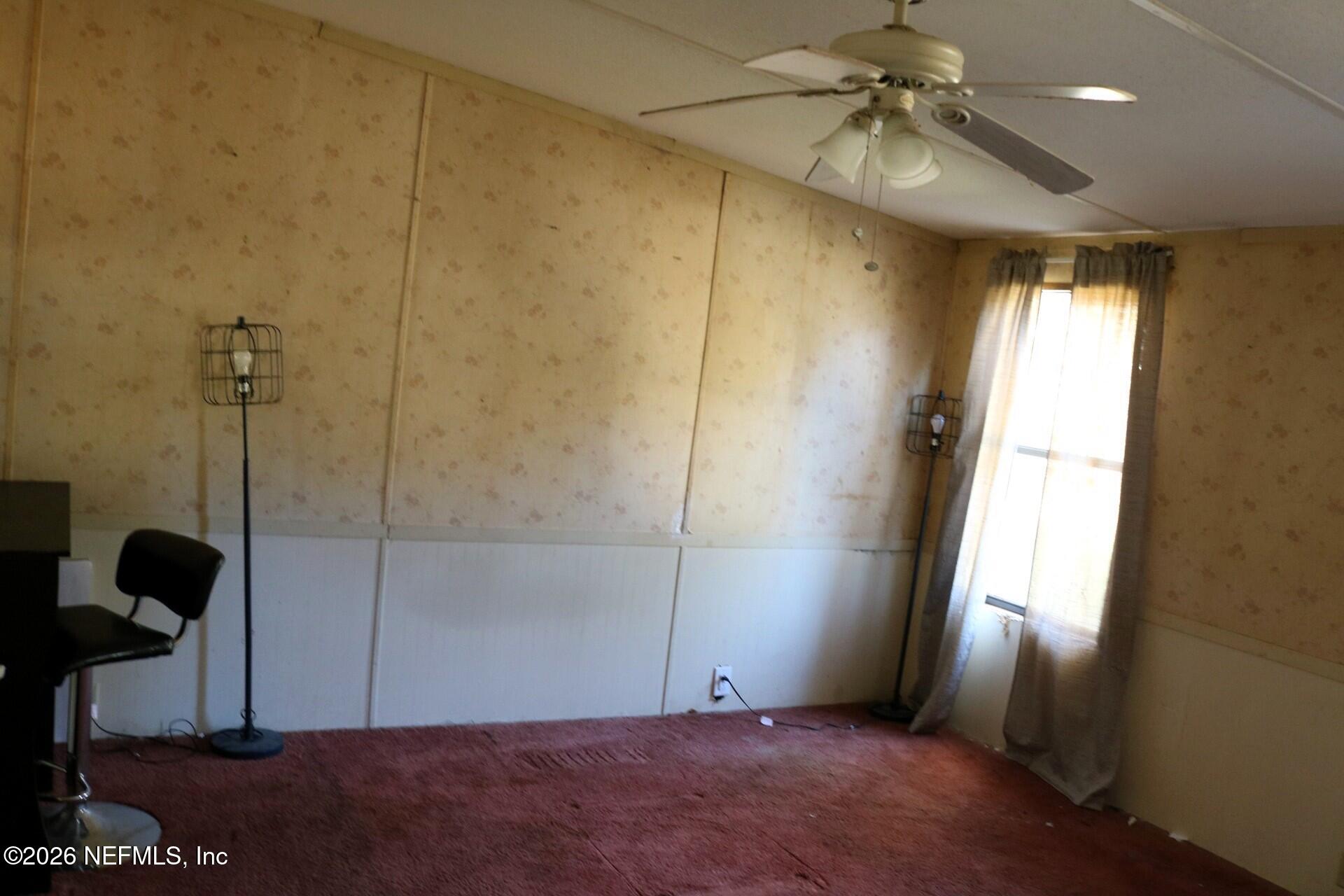 54089 Huckleberry Lane Callahan, FL 32011 - Photo 11 of 18 a view of an empty room and window