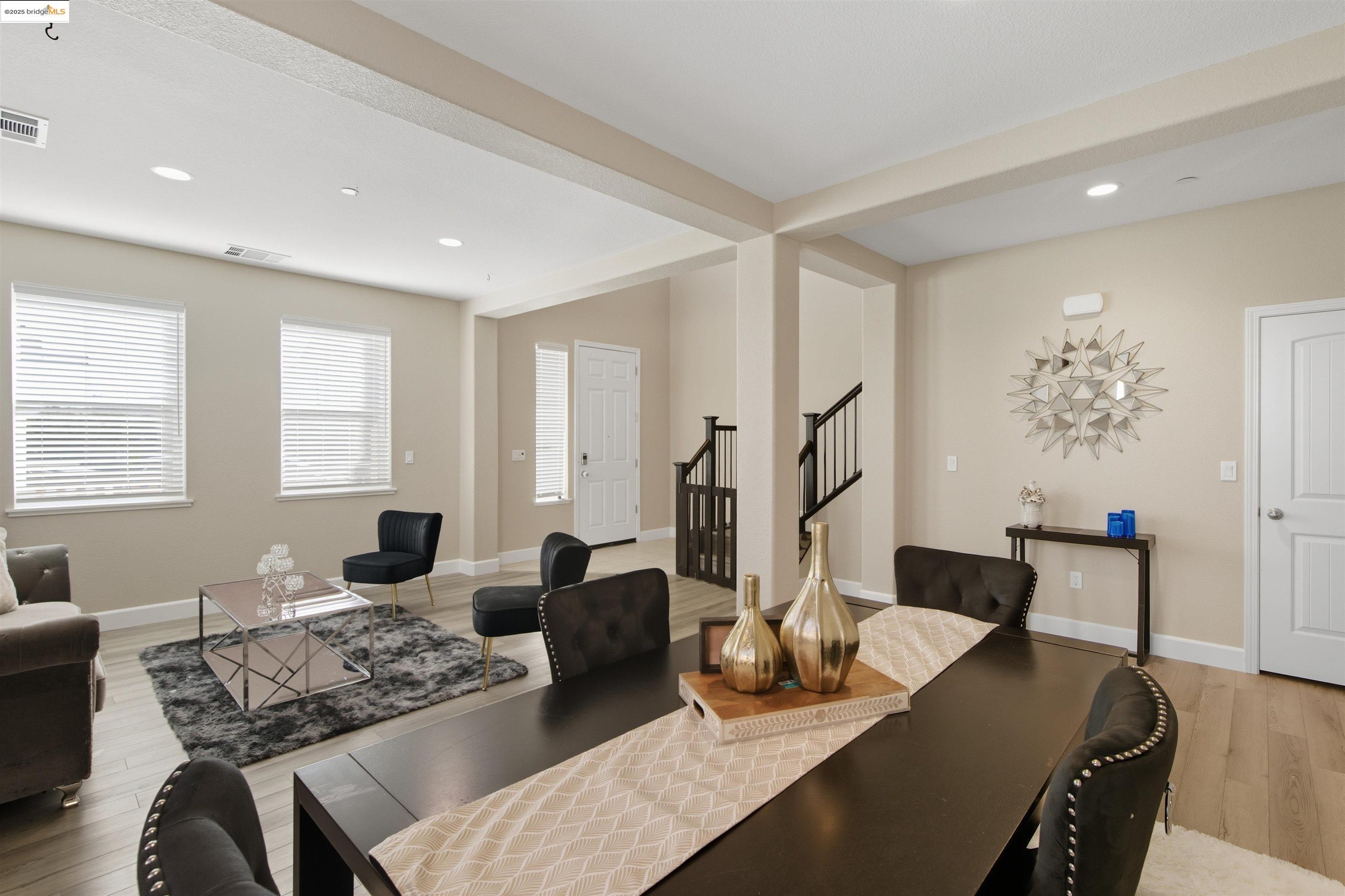 536 Aster Street Vacaville, CA 95688 - Photo 13 of 53 Dining space with recessed lighting, light wood finished floors, stairway, and beamed ceiling