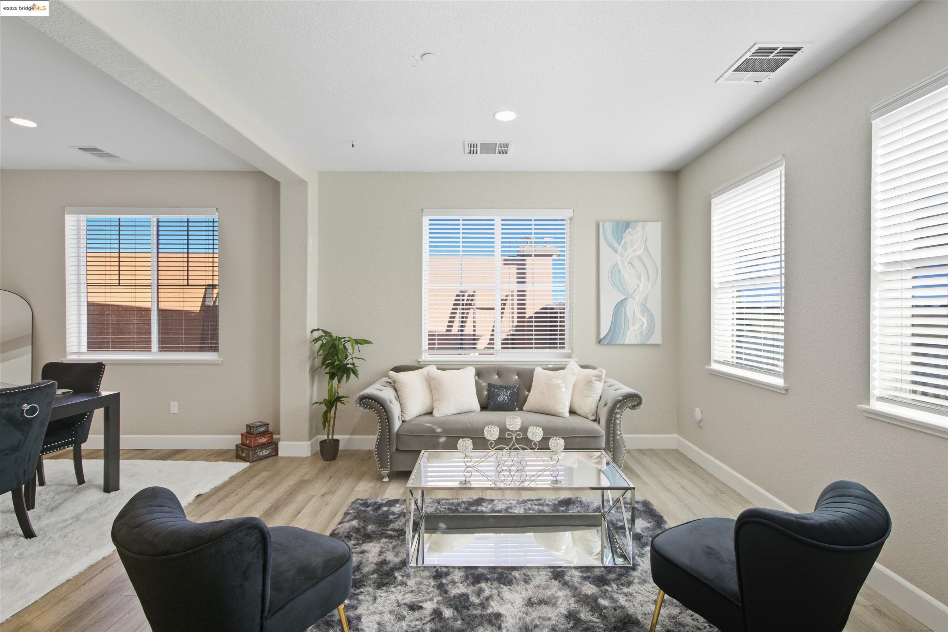 536 Aster Street Vacaville, CA 95688 - Photo 14 of 53 Living room featuring light wood finished floors and recessed lighting