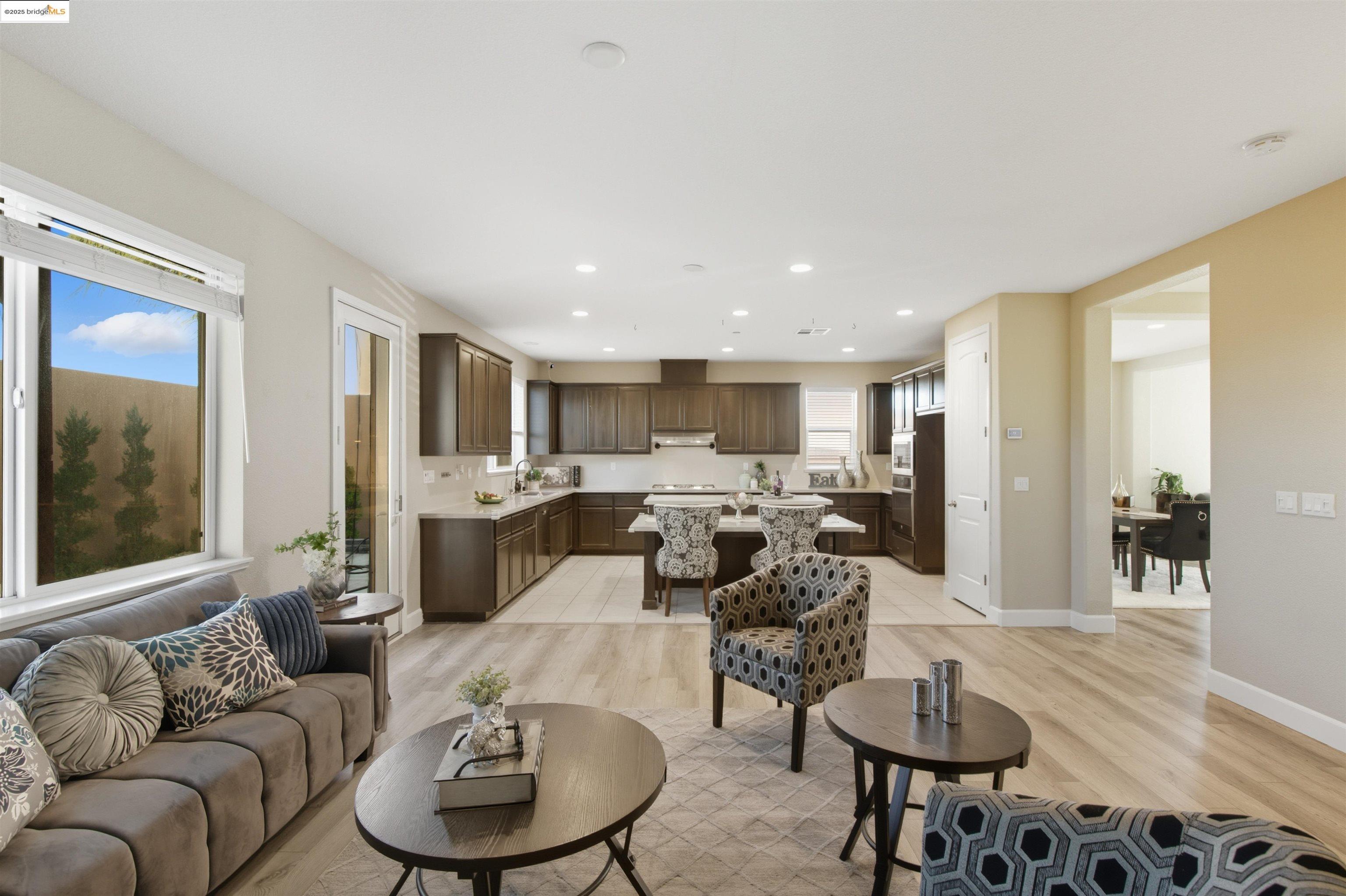 536 Aster Street Vacaville, CA 95688 - Photo 18 of 53 Living room with light wood-type flooring, recessed lighting, and healthy amount of natural light