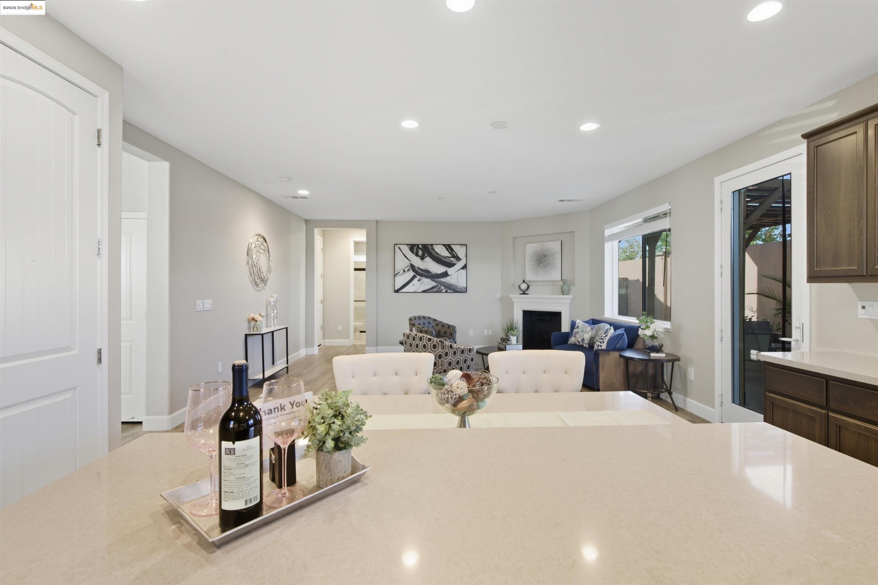 536 Aster Street Vacaville, CA 95688 - Photo 21 of 53 Dining area with recessed lighting, a fireplace, and wood finished floors