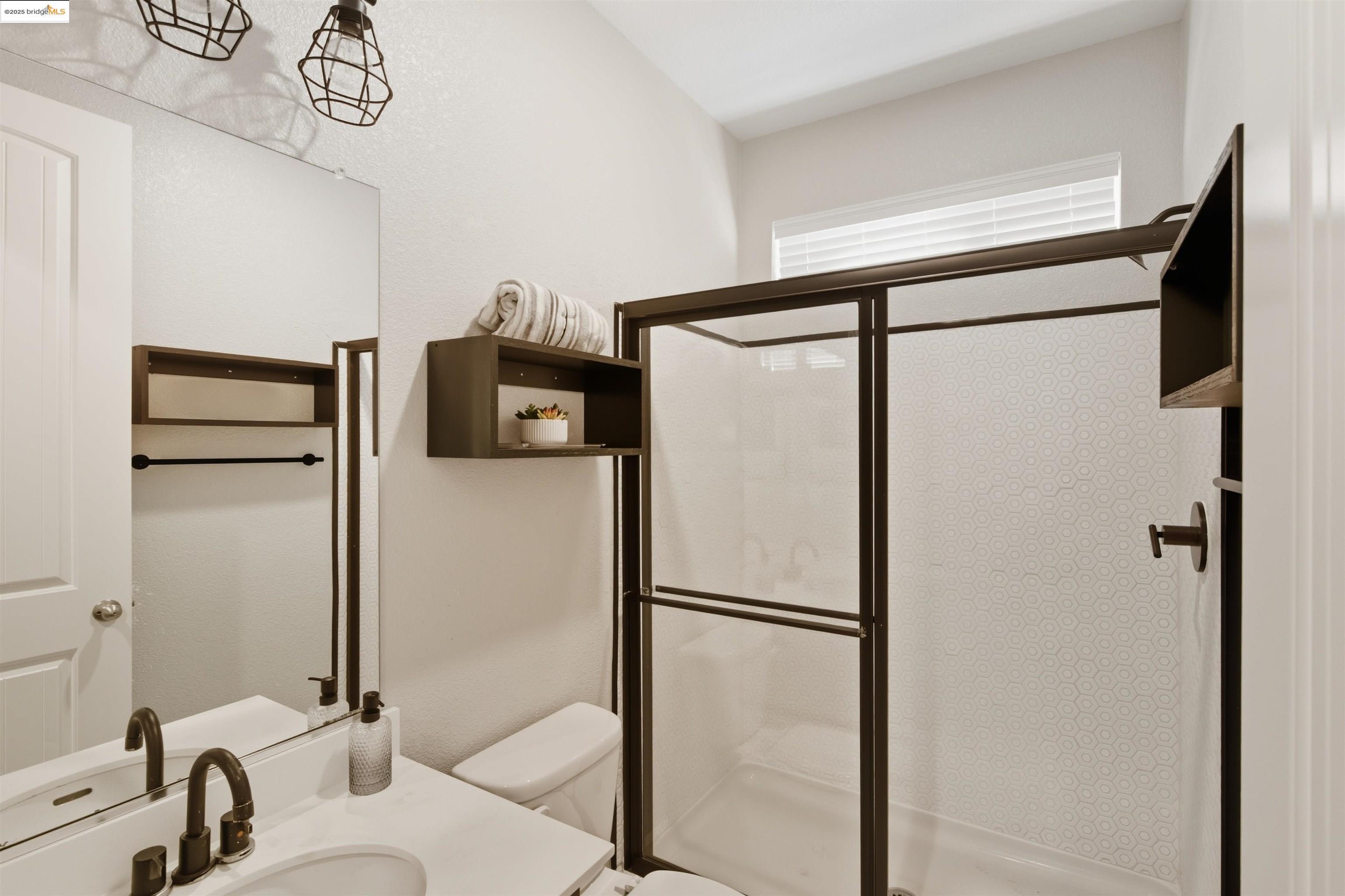 536 Aster Street Vacaville, CA 95688 - Photo 25 of 53 Full bathroom featuring a shower stall and vanity
