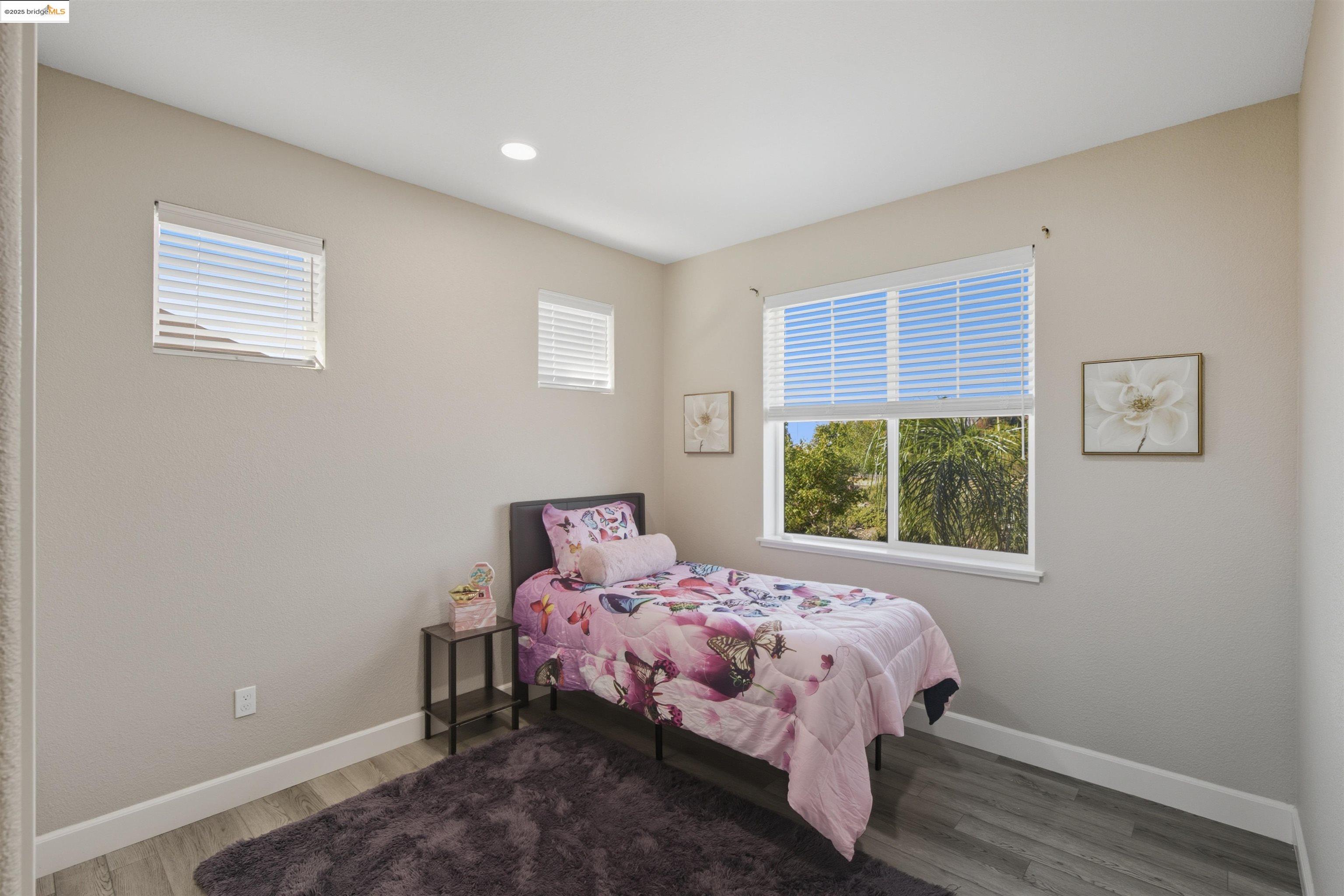 536 Aster Street Vacaville, CA 95688 - Photo 31 of 53 Bedroom with wood finished floors and recessed lighting