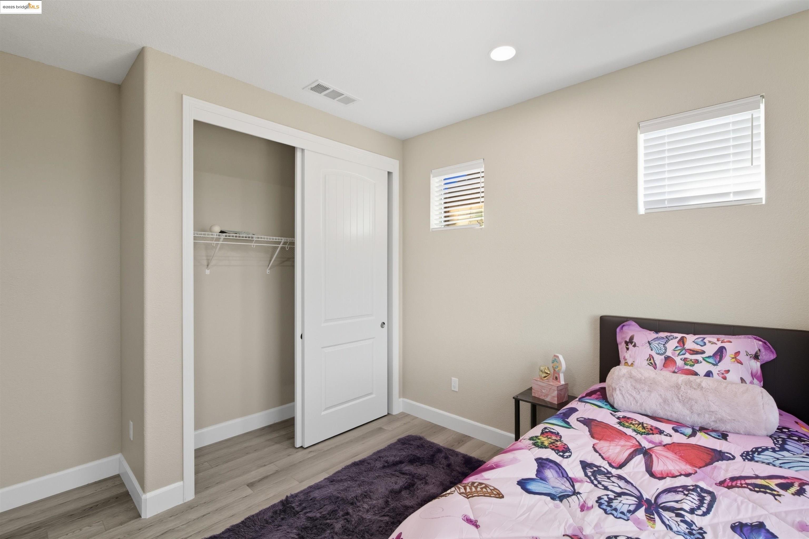 536 Aster Street Vacaville, CA 95688 - Photo 32 of 53 Bedroom with a closet, light wood-style floors, and recessed lighting