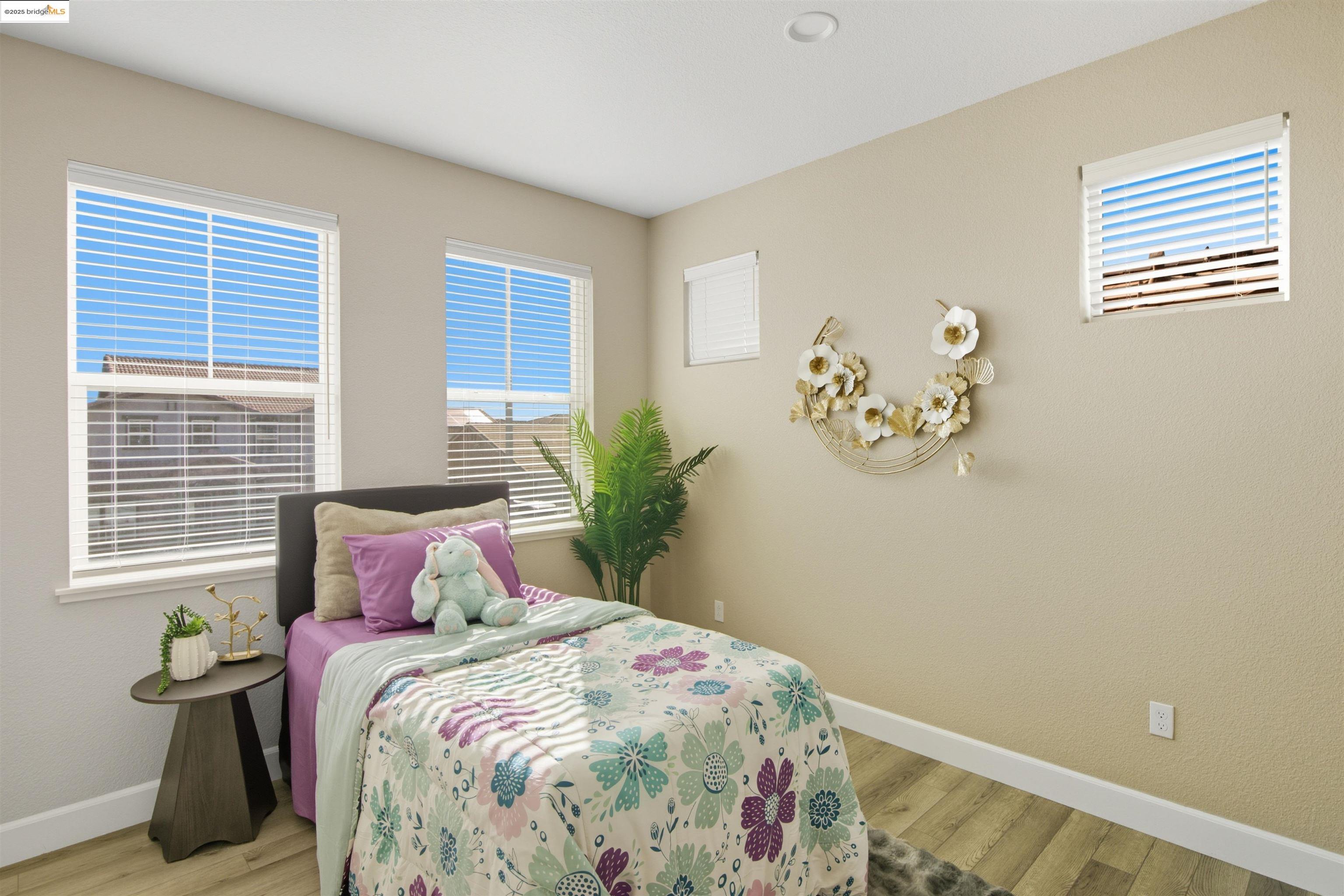 536 Aster Street Vacaville, CA 95688 - Photo 34 of 53 Bedroom featuring wood finished floors and baseboards