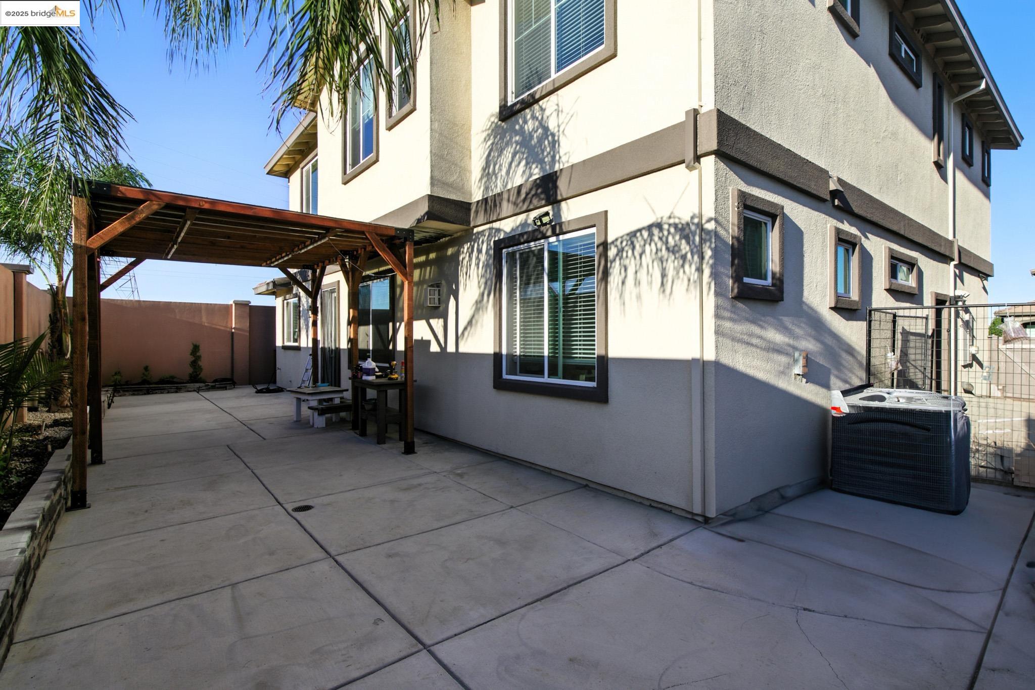 536 Aster Street Vacaville, CA 95688 - Photo 46 of 53 Rear view of house featuring stucco siding and a patio