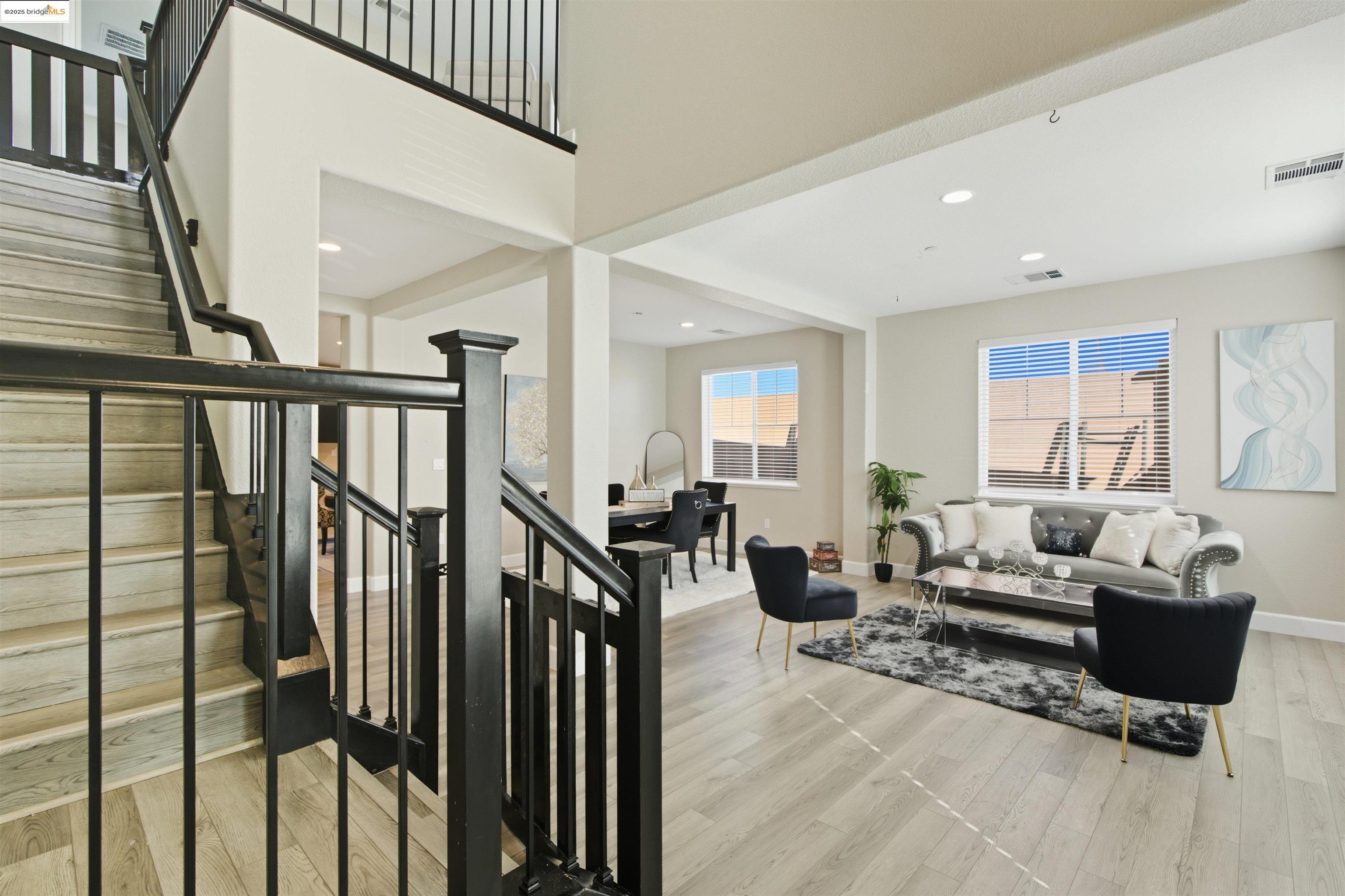 536 Aster Street Vacaville, CA 95688 - Photo 9 of 53 Living room with stairway, light wood-type flooring, and recessed lighting