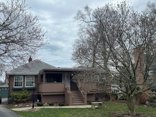 a front view of house with yard