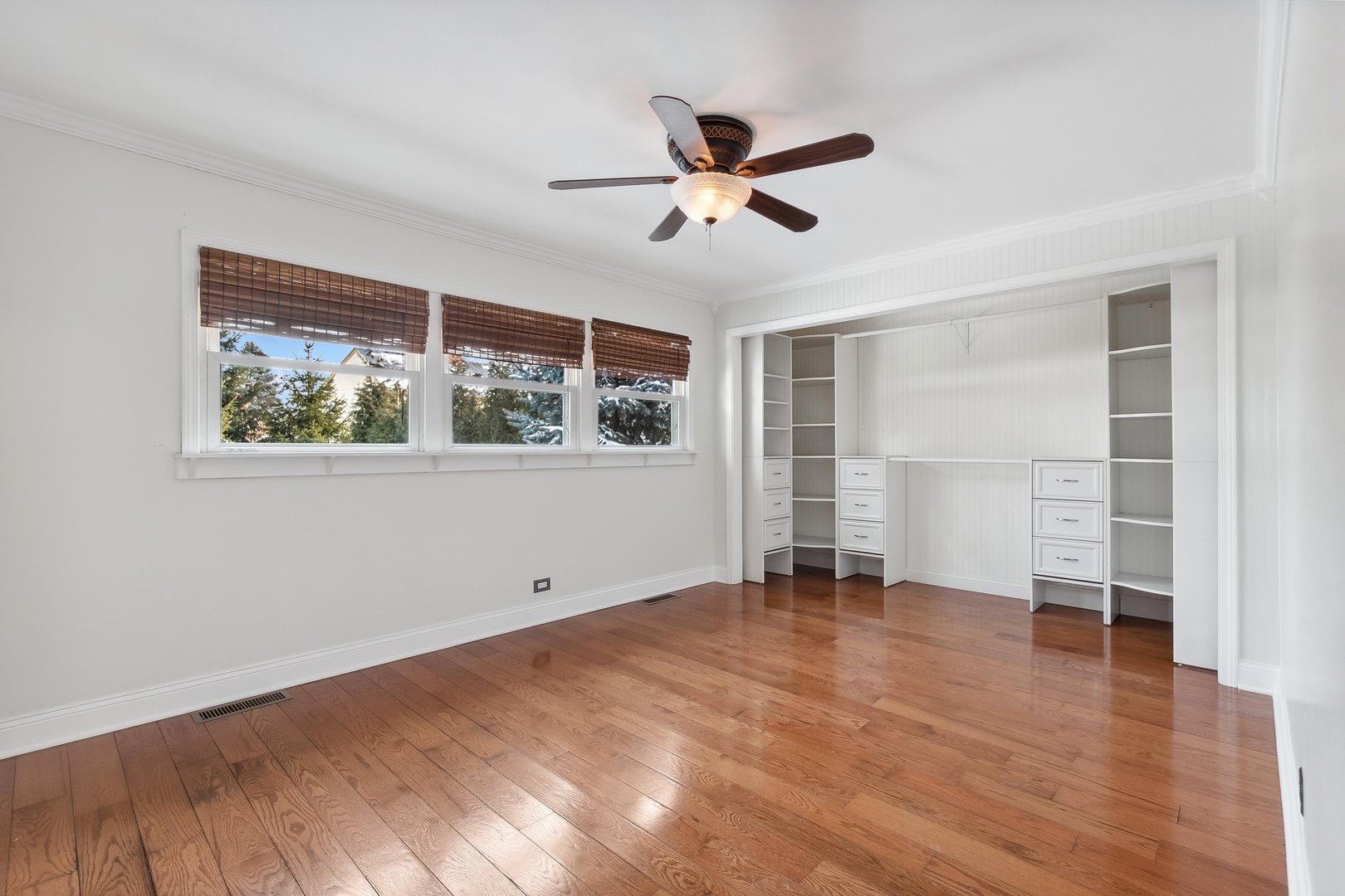 207 North Happ Road Northfield, IL 60093 - Photo 12 of 28 a view of empty room with wooden floor and fan