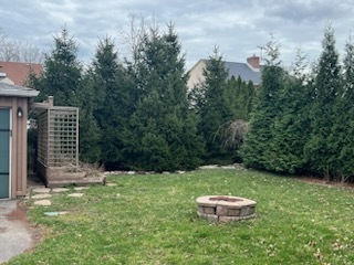 207 North Happ Road Northfield, IL 60093 - Photo 23 of 28 a backyard of a house with lots of green space