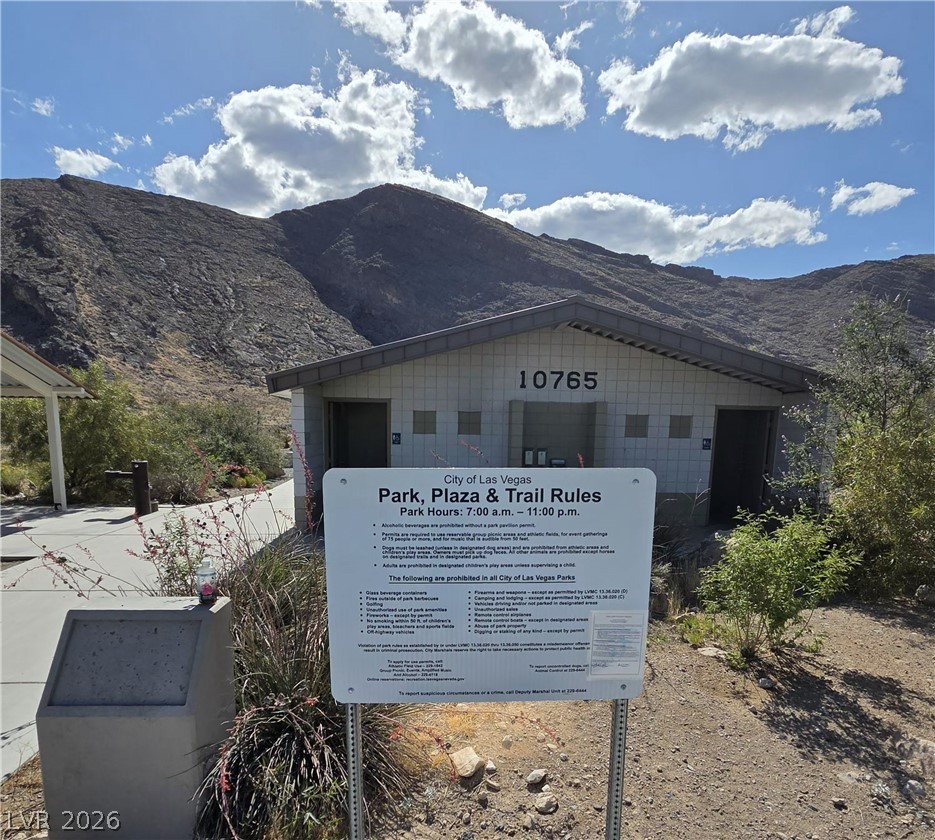 10550 West Alexander Road, Unit 2183 Las Vegas, NV 89129 - Photo 20 of 22 A well-maintained public park facility is nestled against a dramatic mountainous backdrop.
