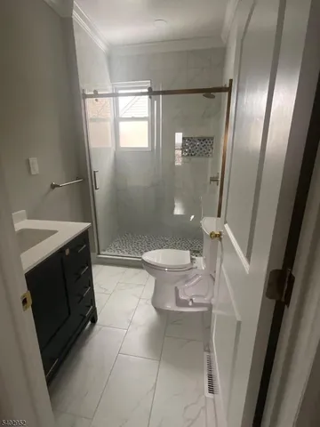 a bathroom with a sink and toilet