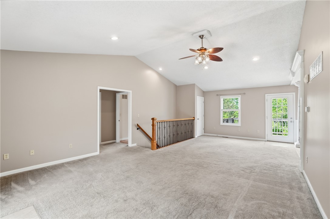 1208 Jarva Lane Springboro, OH 45066 - Photo 18 of 75 This airy living space features vaulted ceilings and plush carpeting.