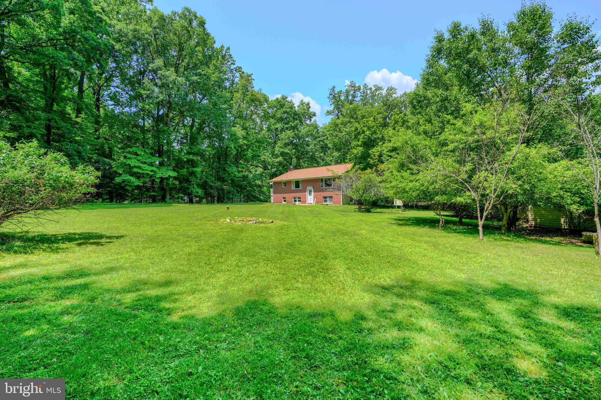 3743 Schroeder Avenue Perry Hall, MD 21128 - Photo 13 of 60 a view of a white house with a yard