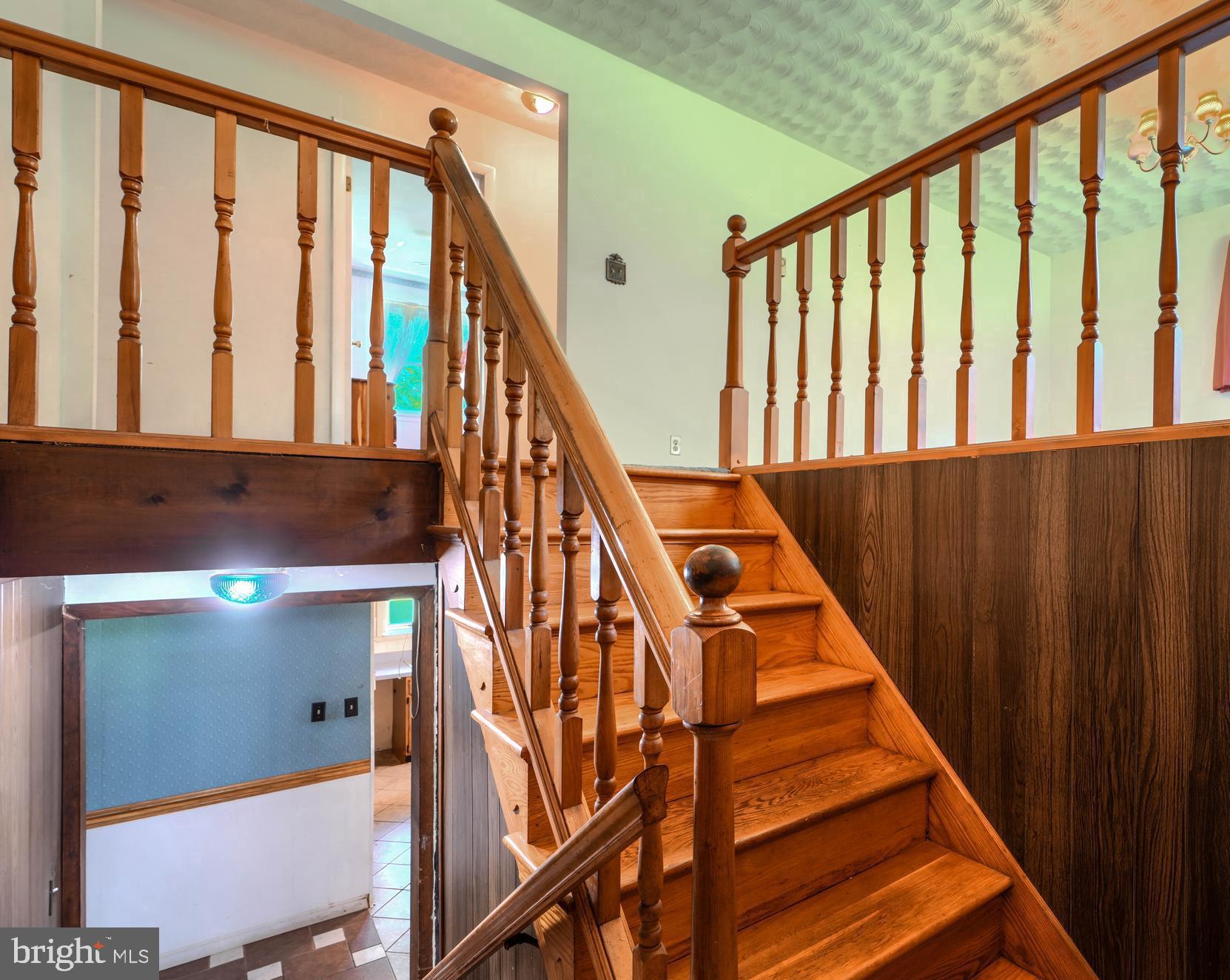 3743 Schroeder Avenue Perry Hall, MD 21128 - Photo 15 of 60 a view of staircase with railing and white walls