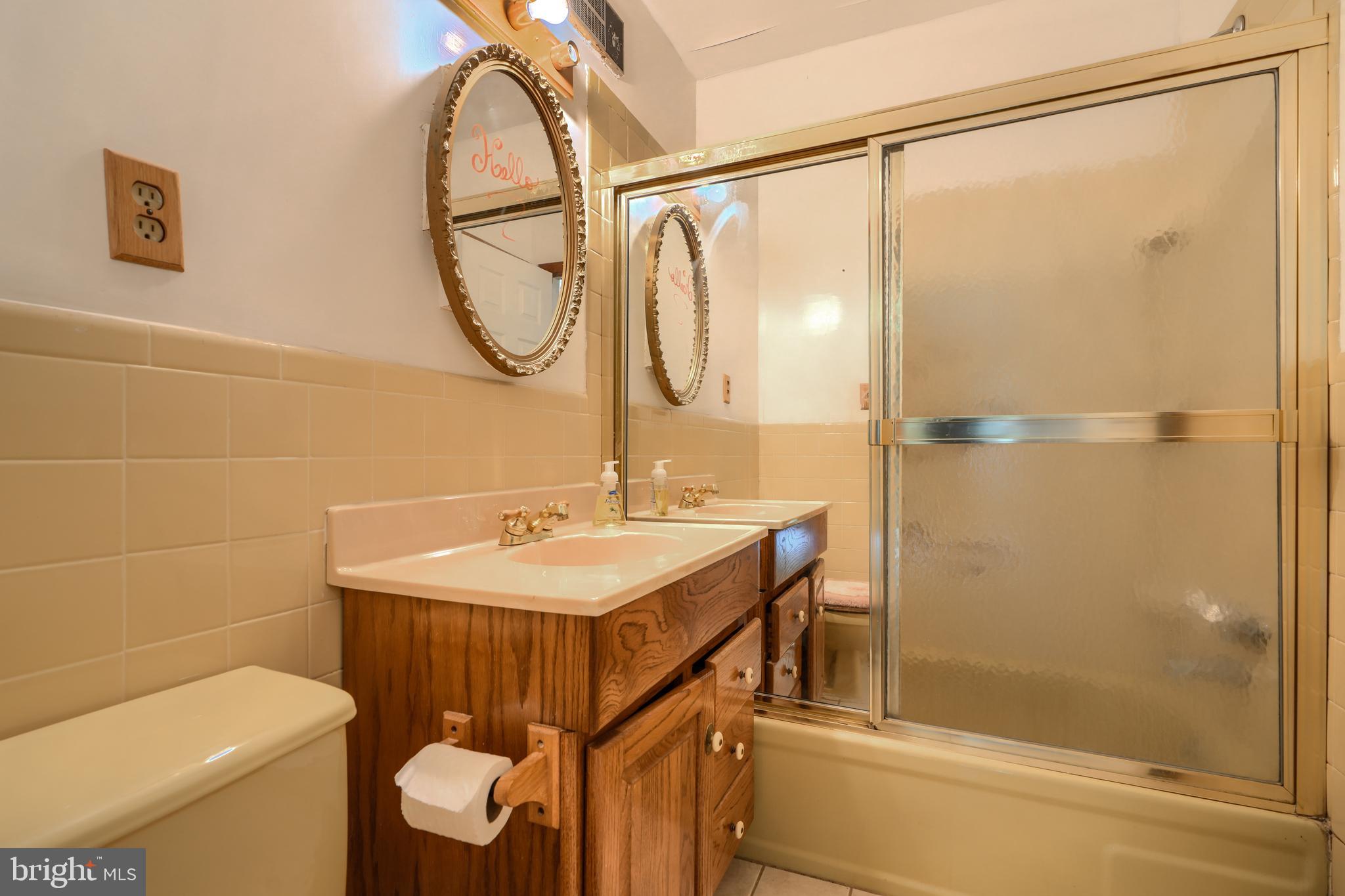 3743 Schroeder Avenue Perry Hall, MD 21128 - Photo 33 of 60 a bathroom with a sink toilet and shower