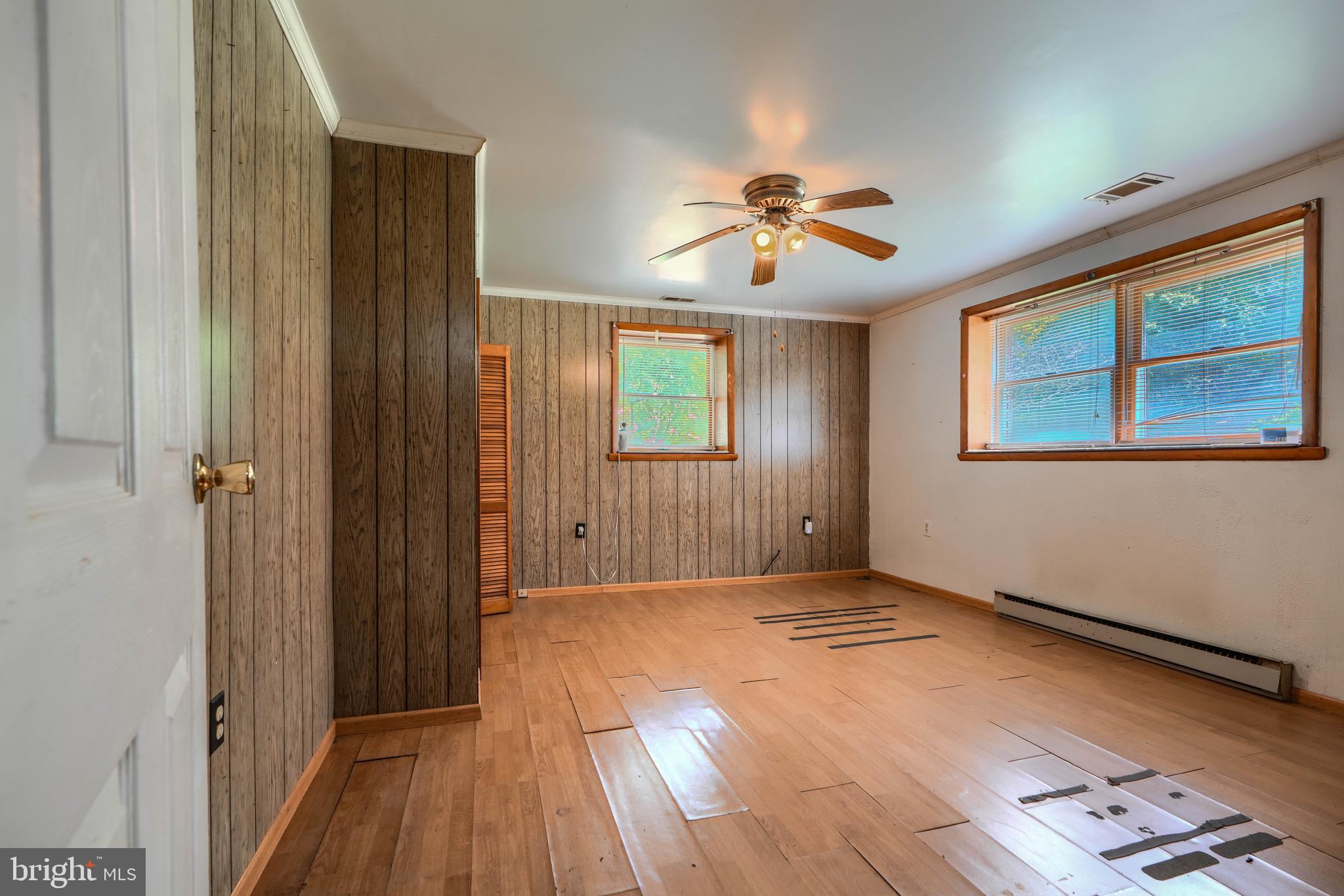 3743 Schroeder Avenue Perry Hall, MD 21128 - Photo 43 of 60 wooden floor in an empty room with a window