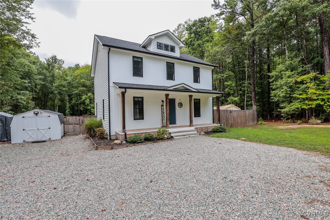 1113 Bradbury Road Moseley, VA 23120 - Photo 1 of 43 a view of a house with backyard and trees