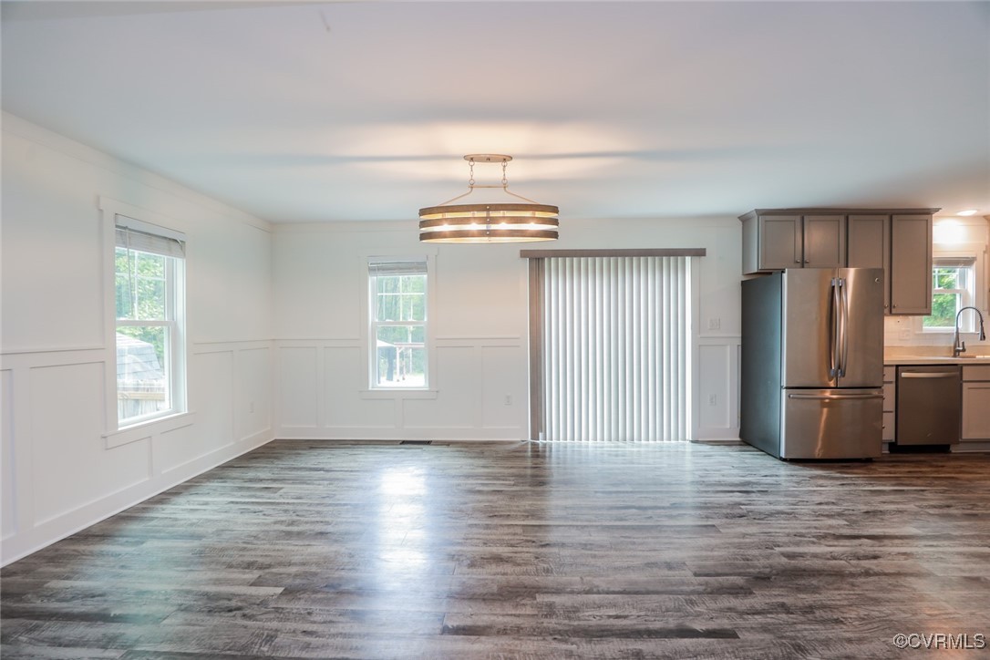 1113 Bradbury Road Moseley, VA 23120 - Photo 13 of 43 a view of a kitchen with wooden floor and electronic appliances