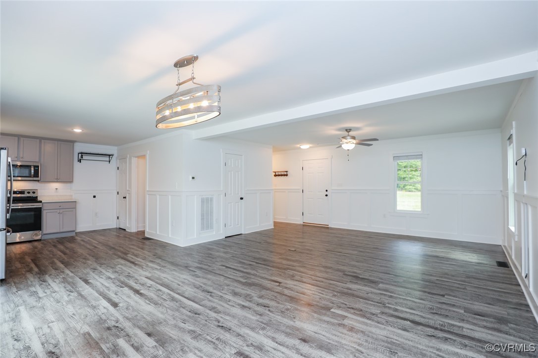 1113 Bradbury Road Moseley, VA 23120 - Photo 15 of 43 a view of empty room with wooden floor and window