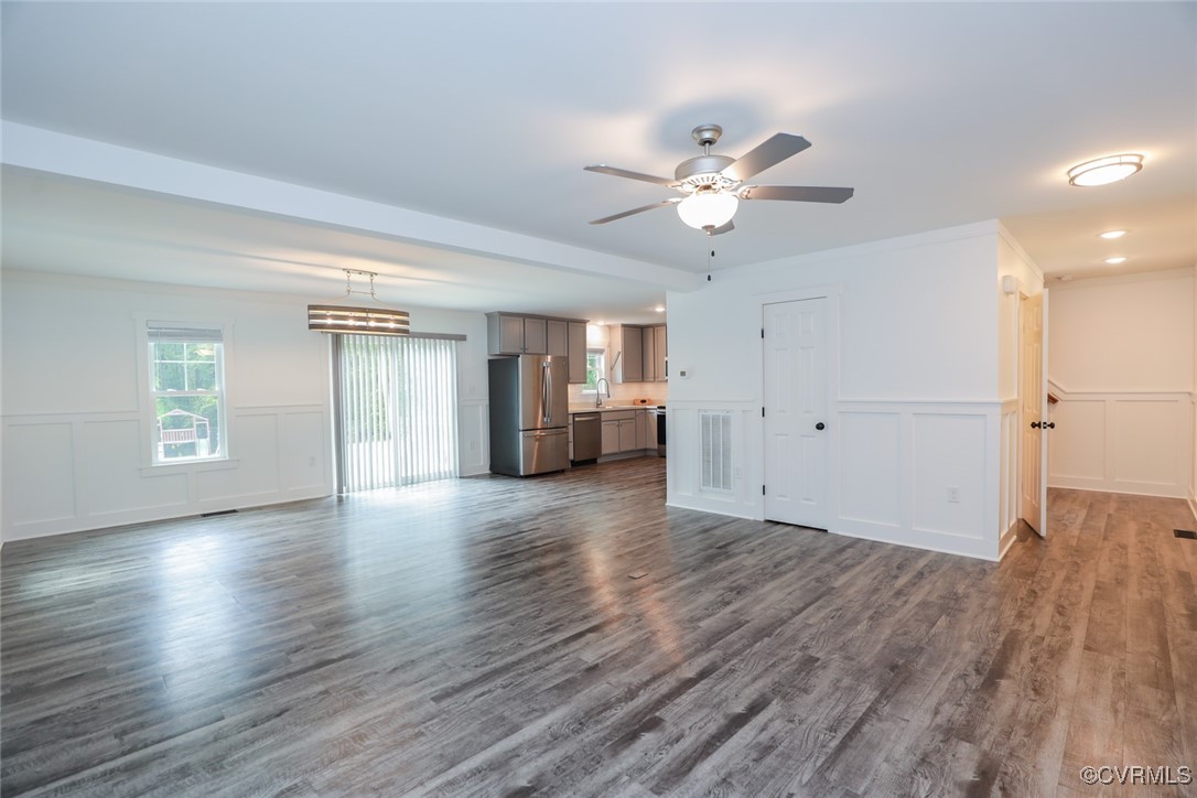 1113 Bradbury Road Moseley, VA 23120 - Photo 20 of 43 a view of an empty room with a window and wooden floor