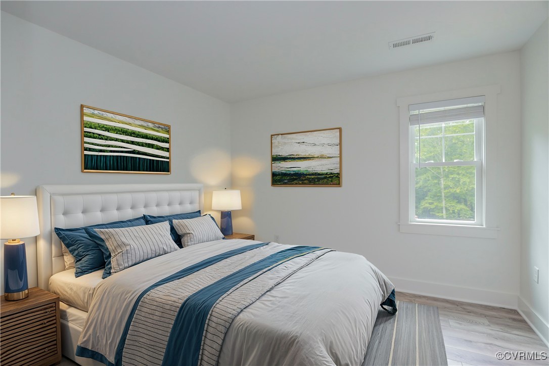 1113 Bradbury Road Moseley, VA 23120 - Photo 28 of 43 a bedroom with a bed and a window