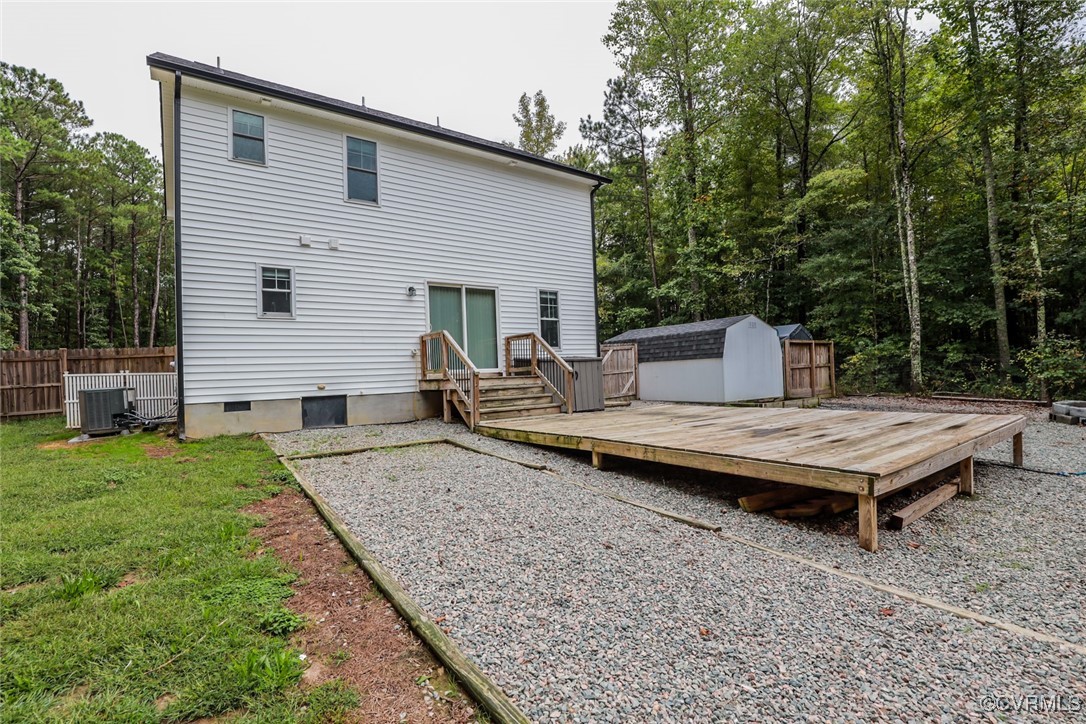 1113 Bradbury Road Moseley, VA 23120 - Photo 30 of 43 a backyard of a house with table and chairs