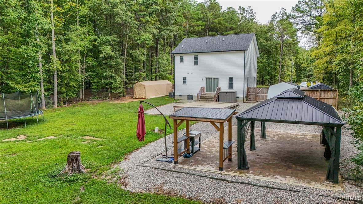 1113 Bradbury Road Moseley, VA 23120 - Photo 37 of 43 a view of a house with backyard porch and sitting area