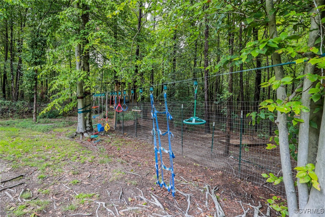 1113 Bradbury Road Moseley, VA 23120 - Photo 38 of 43 a view of a park with swings