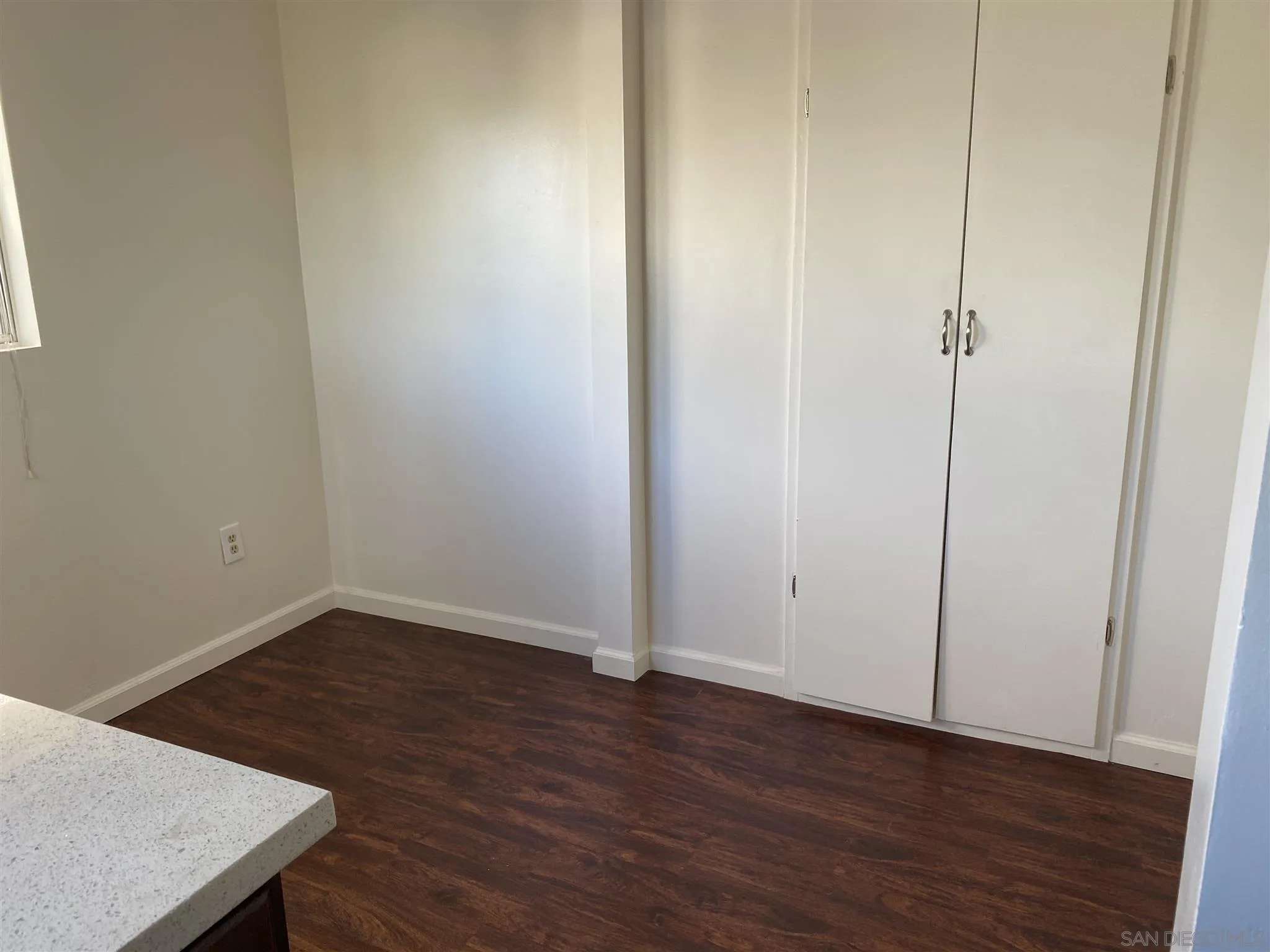 9048 Rosedale Drive Spring Valley, CA 91977 - Photo 10 of 35 an empty room with wooden floor