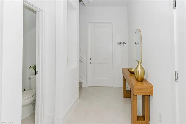 a bathroom with a sink and mirror