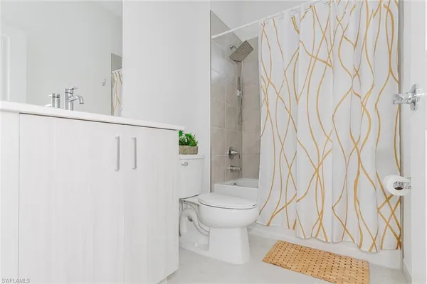 a bathroom with a sink and toilet