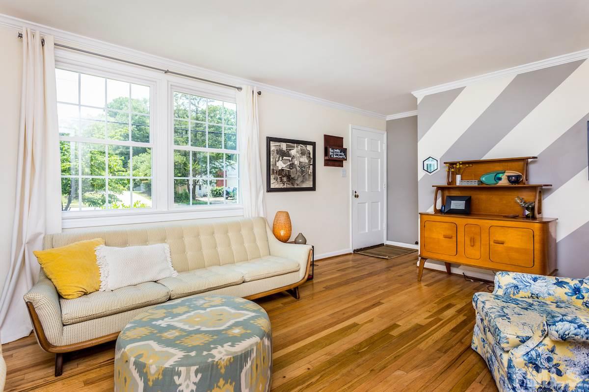 1950 Bernard Street Raleigh, NC 27608 - Photo 6 of 25 a living room with furniture and a window