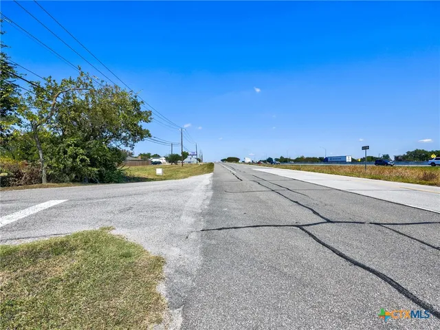 a view of an outdoor space and a yard