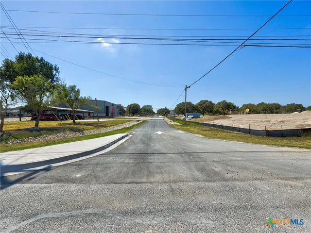 a view of a swimming pool with an outdoor seating