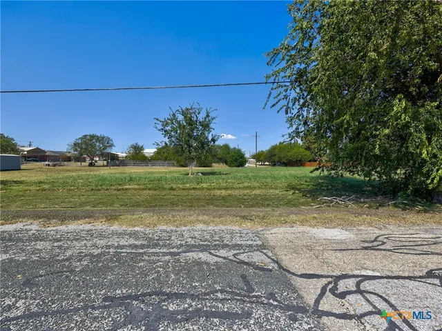 a view of a golf course with a yard
