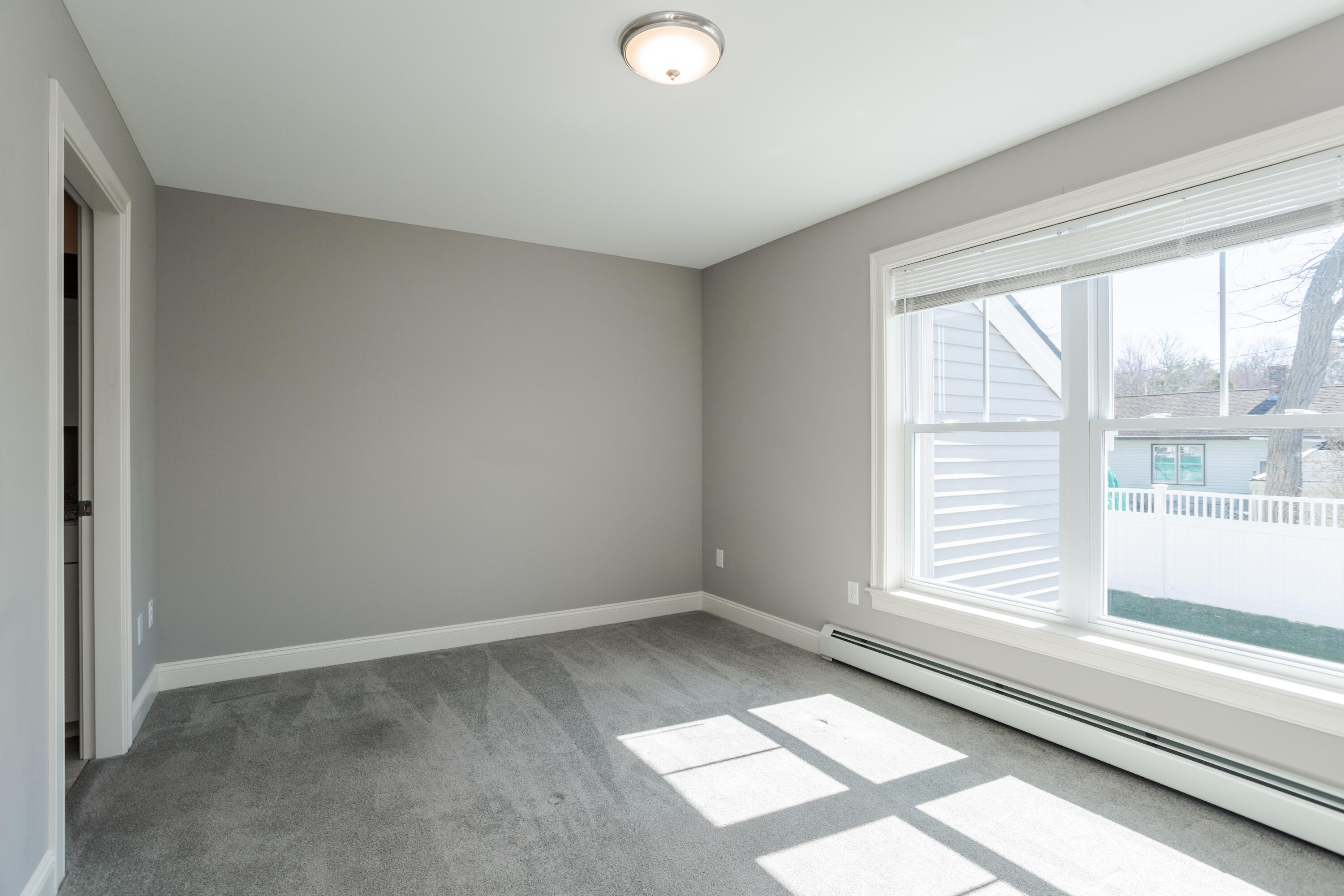4 Levi Lane, Unit 103 Biddeford, ME 04005 - Photo 13 of 34 Primary en-suite bedroom