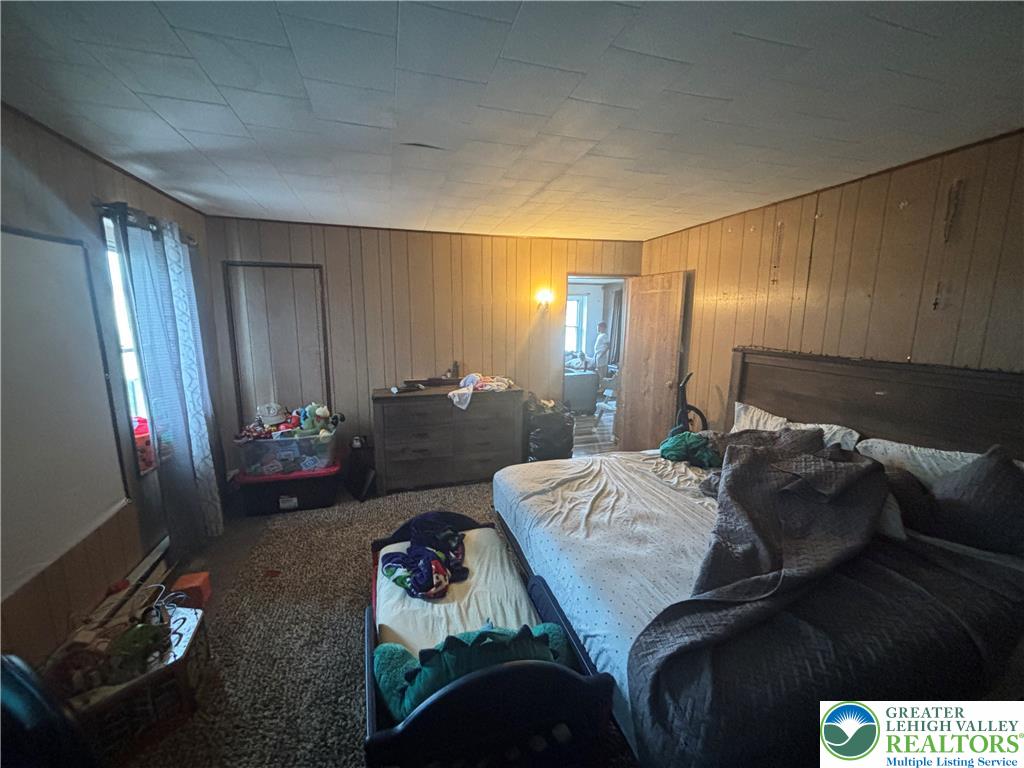 3404 North Ruch Street Whitehall, PA 18052 - Photo 24 of 36 A well-lit bedroom offering a cozy and private retreat.