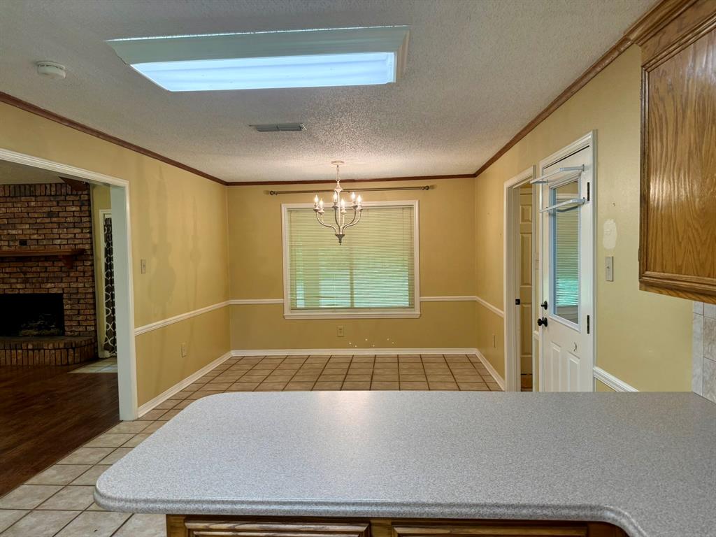 11535 Timber Ridge Drive Keithville, LA 71047 - Photo 7 of 39 a bathroom with a tub and a shower