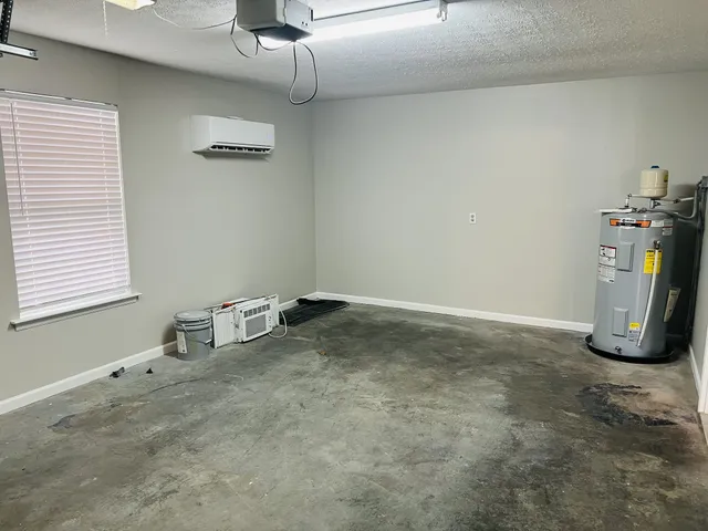 a view of a storage and utility room with windows