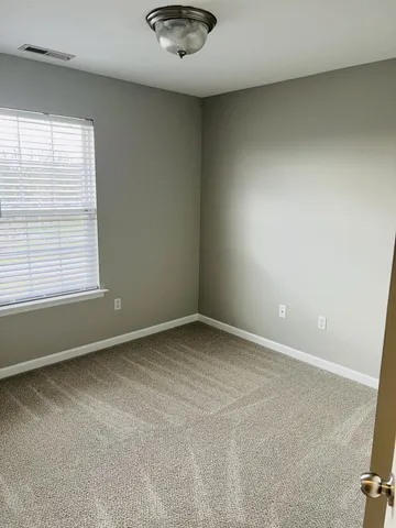 an empty room with a workbench