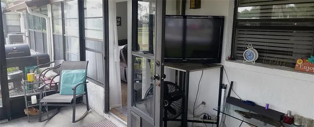 a kitchen with a refrigerator and a stove