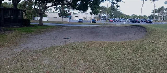 a view of road with card parked