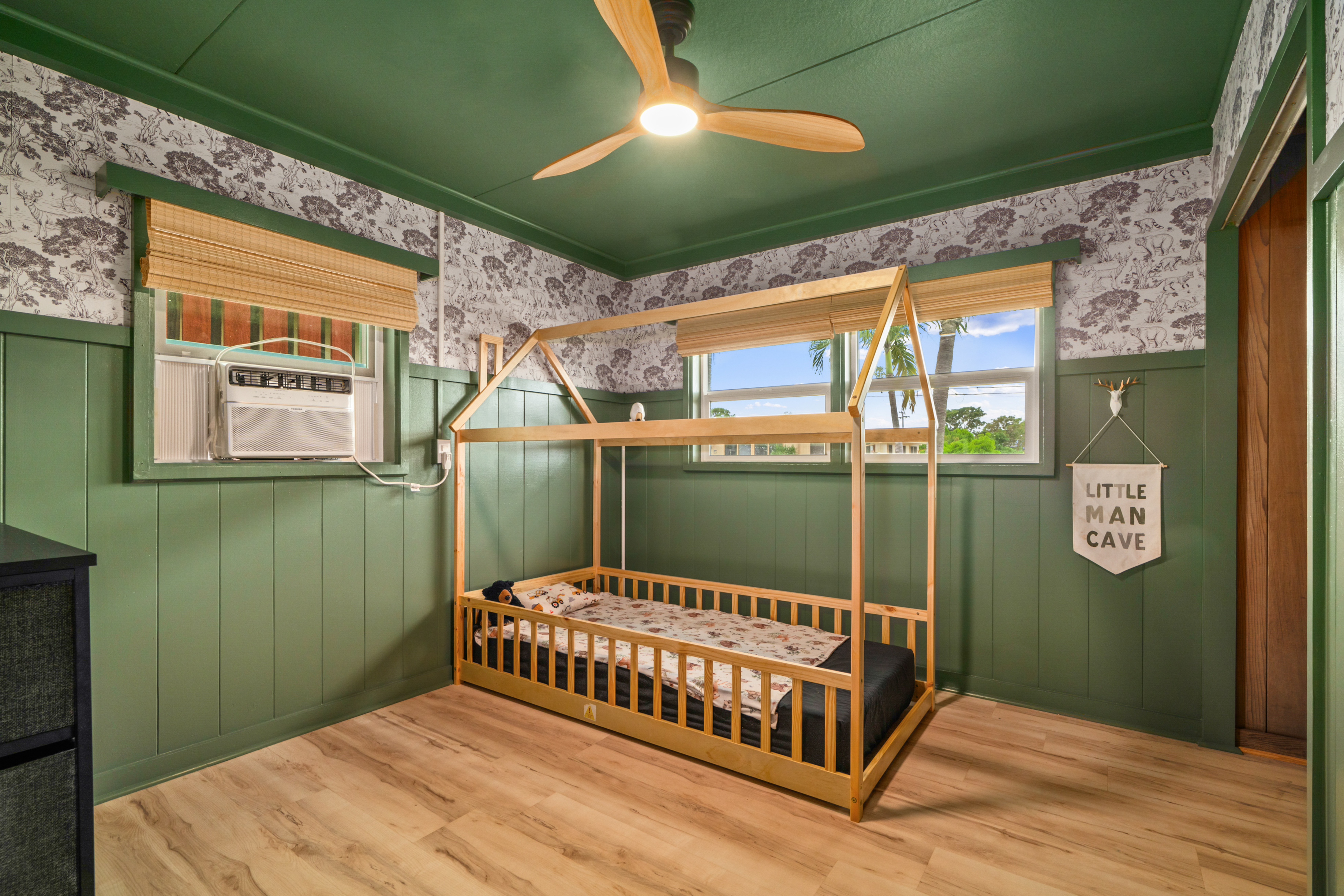 9639 Maule Road Waimea, HI 96796 - Photo 20 of 29 a bedroom with a bed and a window