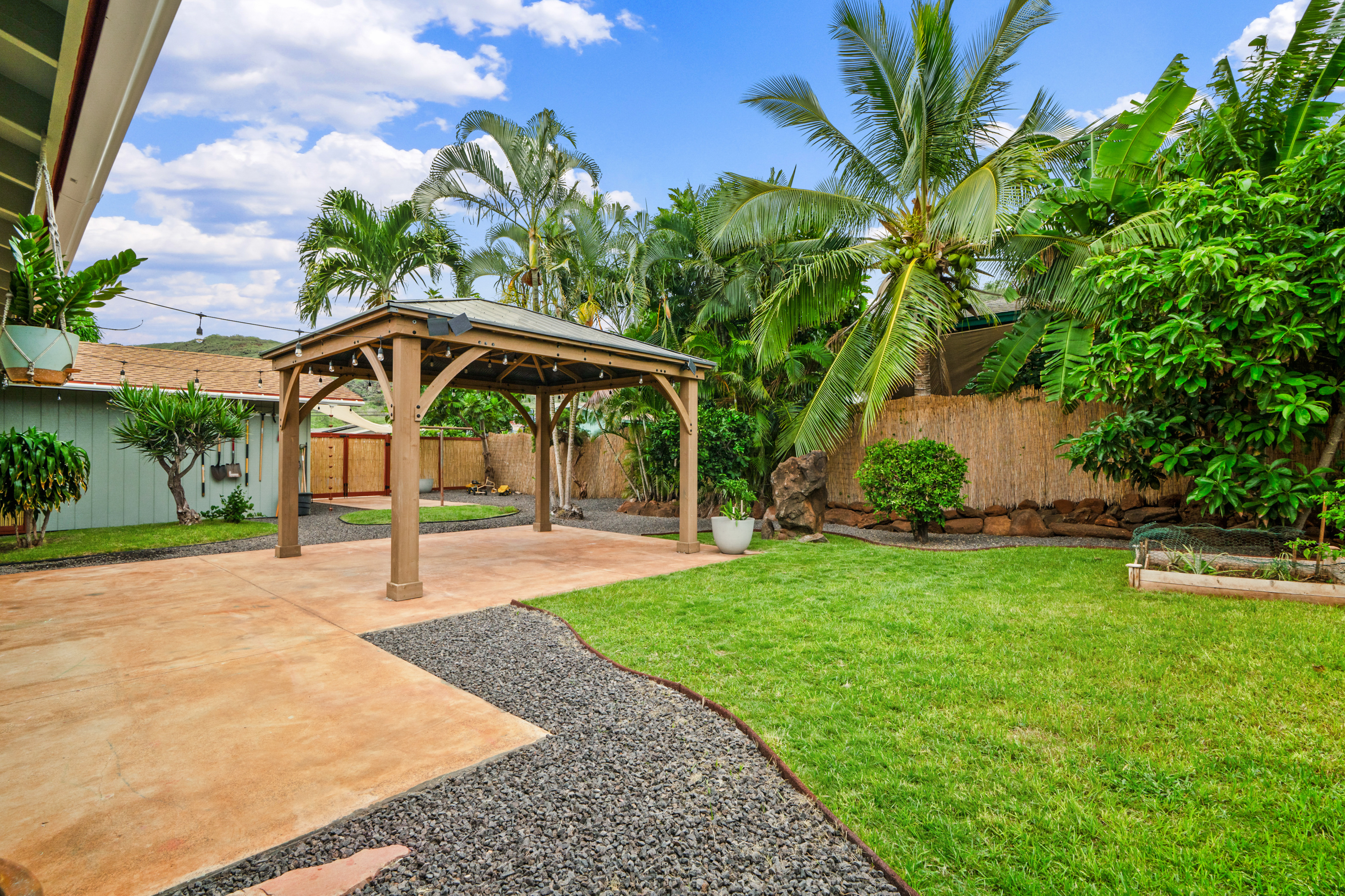 9639 Maule Road Waimea, HI 96796 - Photo 21 of 29 a view of a backyard with a garden