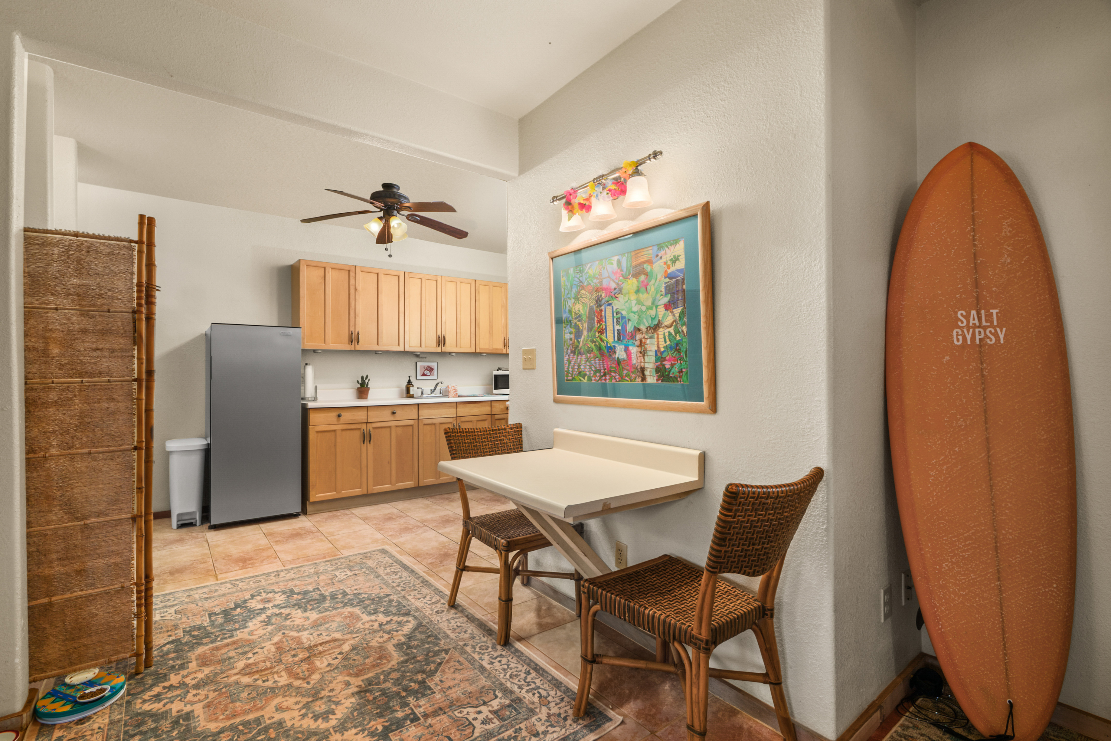 9639 Maule Road Waimea, HI 96796 - Photo 23 of 29 a view of a dining room with furniture and a chandelier