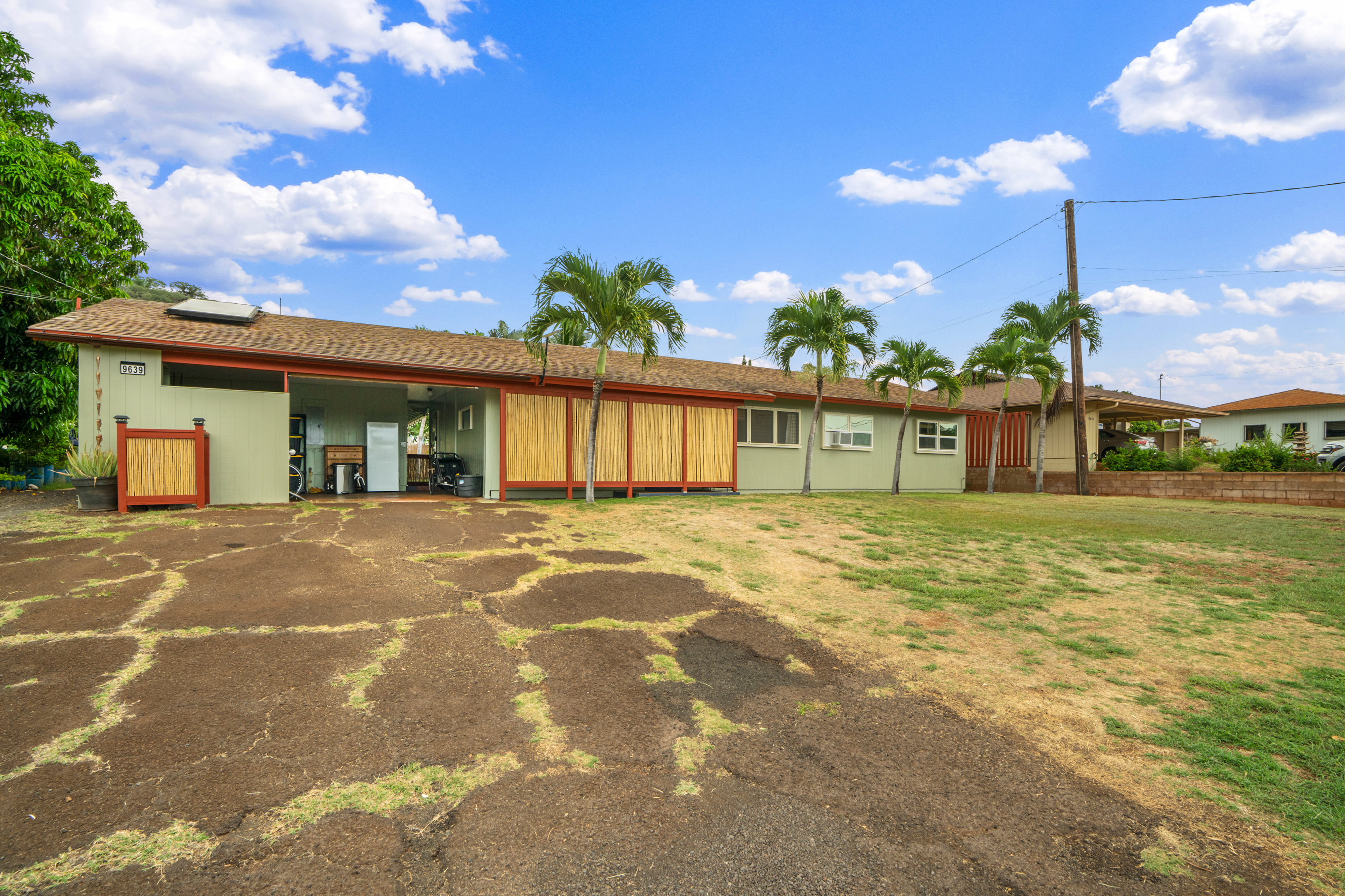 9639 Maule Road Waimea, HI 96796 - Photo 27 of 29 a front view of a house with a garden