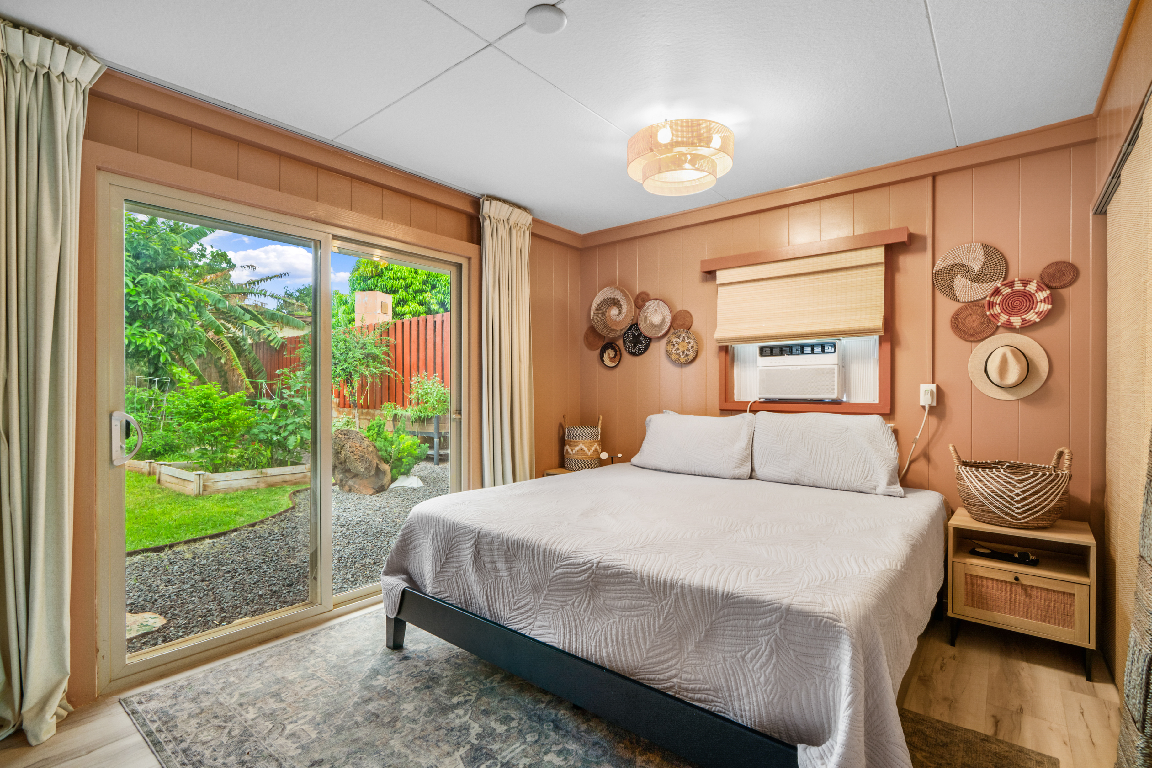 9639 Maule Road Waimea, HI 96796 - Photo 4 of 29 a bedroom with a bed and a window